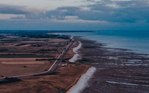 Preview wallpaper coast, horizon, road, sea, field