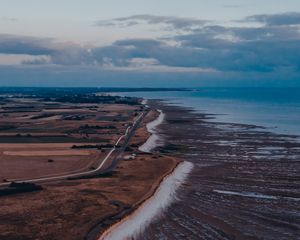 Preview wallpaper coast, horizon, road, sea, field