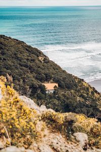 Preview wallpaper coast, house, aerial view, sea, hill, forest