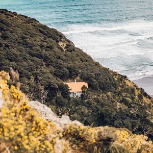 Preview wallpaper coast, house, aerial view, sea, hill, forest