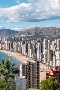 Preview wallpaper coast, houses, beach, mountains, buildings, city