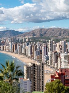Preview wallpaper coast, houses, beach, mountains, buildings, city