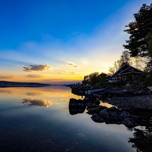 Preview wallpaper coast, lake, reflection, clouds, twilight