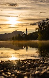 Preview wallpaper coast, lake, reflection, towers, twilight