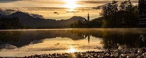 Preview wallpaper coast, lake, reflection, towers, twilight