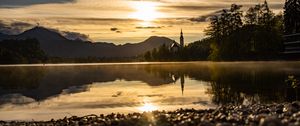 Preview wallpaper coast, lake, reflection, towers, twilight
