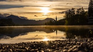 Preview wallpaper coast, lake, reflection, towers, twilight