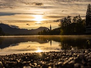 Preview wallpaper coast, lake, reflection, towers, twilight