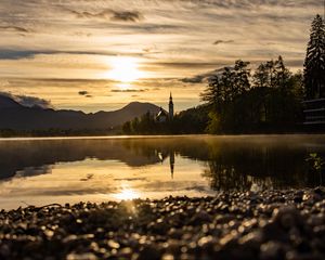 Preview wallpaper coast, lake, reflection, towers, twilight