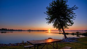 Preview wallpaper coast, lake, tree, table, benches, evening, decline, romanticism