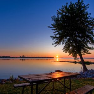 Preview wallpaper coast, lake, tree, table, benches, evening, decline, romanticism