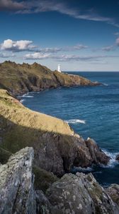 Preview wallpaper coast, lighthouse, rocks, sea