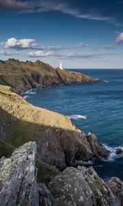 Preview wallpaper coast, lighthouse, rocks, sea
