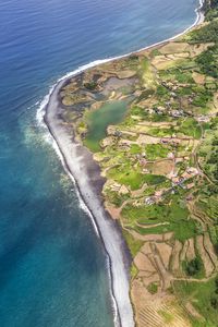 Preview wallpaper coast, ocean, houses, aerial view, forest, road