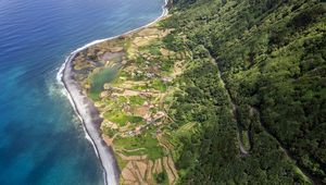 Preview wallpaper coast, ocean, houses, aerial view, forest, road