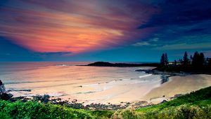 Preview wallpaper coast, ocean, waves, sand, beach, vegetation, sky, evening, bay, colors, tranquillity