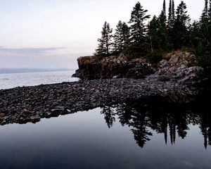 Preview wallpaper coast, pebbles, rock, trees