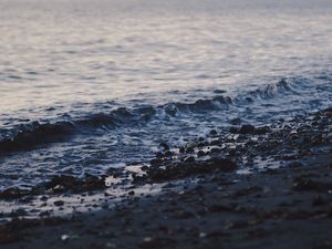 Preview wallpaper coast, pebbles, sea, waves, blur