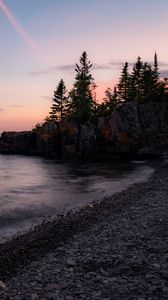 Preview wallpaper coast, pebbles, sea, trees, twilight