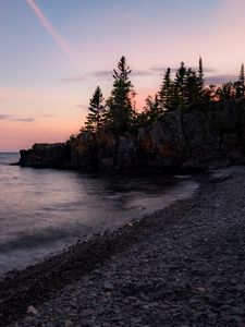 Preview wallpaper coast, pebbles, sea, trees, twilight