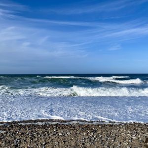 Preview wallpaper coast, pebbles, sea, waves, foam, nature