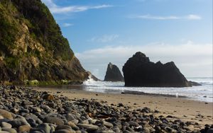 Preview wallpaper coast, pebbles, sea, rocks