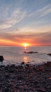 Preview wallpaper coast, pebbles, stones, sea, sunset