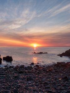 Preview wallpaper coast, pebbles, stones, sea, sunset