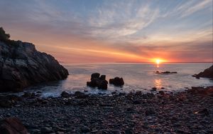 Preview wallpaper coast, pebbles, stones, sea, sunset