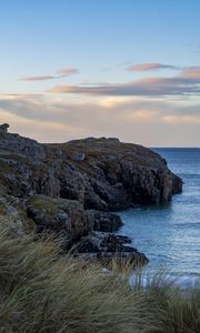 Preview wallpaper coast, rock, cliff, sea, grass, nature