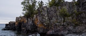 Preview wallpaper coast, rock, trees, sea, pebbles, nature