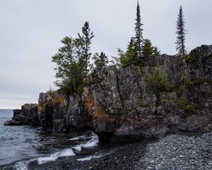 Preview wallpaper coast, rock, trees, sea, pebbles, nature