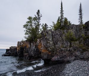 Preview wallpaper coast, rock, trees, sea, pebbles, nature