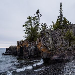 Preview wallpaper coast, rock, trees, sea, pebbles, nature