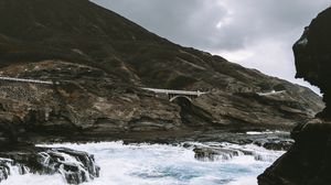 Preview wallpaper coast, rocks, bridge, waves, sea