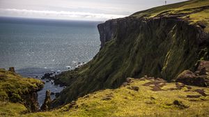 Preview wallpaper coast, rocks, cliff, sea, grass