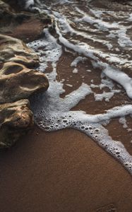 Preview wallpaper coast, rocks, foam, sea, surf