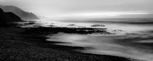 Preview wallpaper coast, rocks, fog, black and white