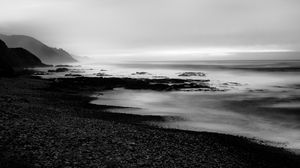 Preview wallpaper coast, rocks, fog, black and white
