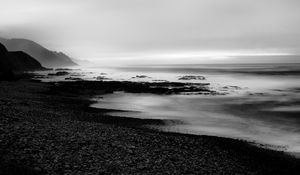 Preview wallpaper coast, rocks, fog, black and white