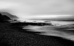 Preview wallpaper coast, rocks, fog, black and white