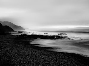 Preview wallpaper coast, rocks, fog, black and white