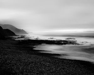 Preview wallpaper coast, rocks, fog, black and white
