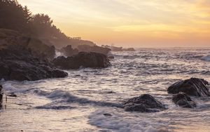 Preview wallpaper coast, rocks, sea, sunset