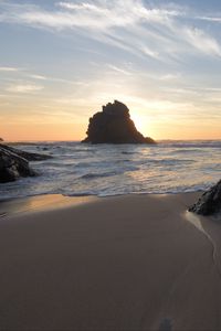 Preview wallpaper coast, rocks, sea, water, sunset