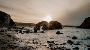 Preview wallpaper coast, rocks, sea, twilight
