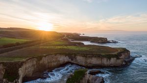 Preview wallpaper coast, rocks, sea, water, sun, landscape, aerial view