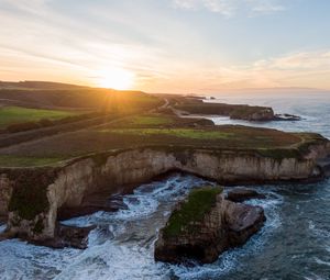 Preview wallpaper coast, rocks, sea, water, sun, landscape, aerial view