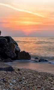 Preview wallpaper coast, rocks, sea, water, waves, sunset