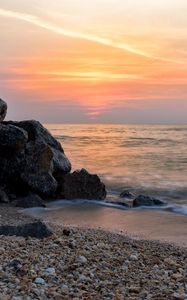 Preview wallpaper coast, rocks, sea, water, waves, sunset